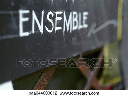 Stock Image - Together text in French, on blackboard. Fotosearch