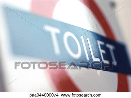 Toilet text on sign, close-up, blurred View Large Photo Image Picture - Toilet text on sign, close-up, blurred. Fotosearch