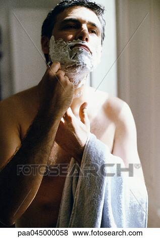 Man shaving, waist up, close-up View Large Photo Image Stock Photo - Man shaving, waist up, close-up. Fotosearch