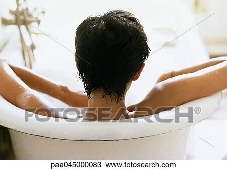 Woman in bathtub, rear view, close-up View Large Photo Image Stock Image - Woman in bathtub, rear view, close-up. Fotosearch