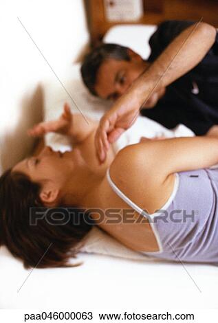 Couple lying on bed, blurred View Large Photo Image Stock Image - Couple lying on bed, blurred. Fotosearch