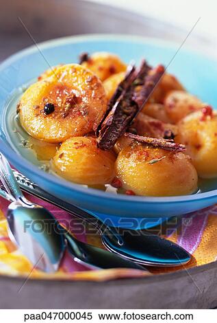 Bowl of cooked apricots with spices, close-up View Large Photo Image Stock Photography - Bowl of cooked apricots with spices, close-up. Fotosearch