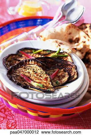 Grilled eggplant on stack of white plates View Large Photo Image Stock Image - Grilled eggplant on stack of white plates. Fotosearch
