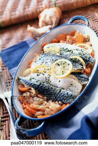 Mackerel in casserole dish with vegetables, close-up View Large Photo Image Stock Photo - Mackerel in casserole dish with vegetables, close-up. Fotosearch