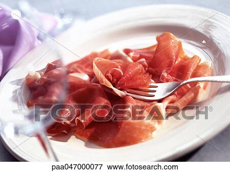 Plate of Parma ham with fork, close-up View Large Photo Image Stock Photo - Plate of Parma ham with fork, close-up. Fotosearch