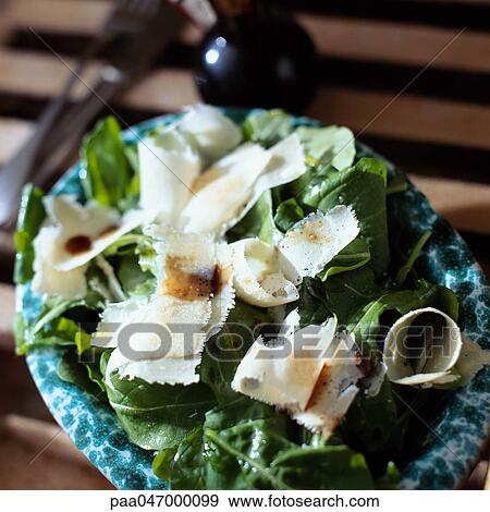 Salad with parmesan, high angle view, close-up View Large Photo Image Stock Photo - Salad with parmesan, high angle view, close-up. Fotosearch