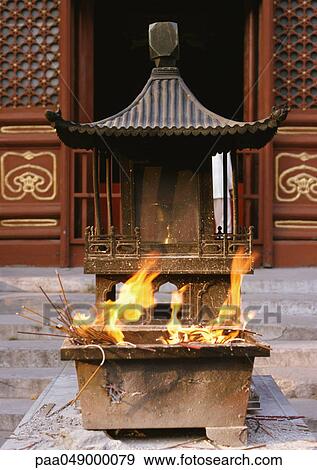 China, Beijing, fire burning in altar at temple entrance View Large Photo Image Stock Photo - China, Beijing, fire burning in altar at temple entrance. Fotosearch