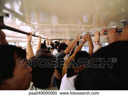 Stock Photography - China, Hebei Province, Beijing, crowded bus. Fotosearch