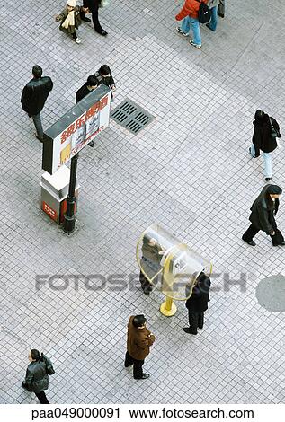China, Liaoning, Dalian, people in street, elevated view View Large Photo Image Stock Image - China, Liaoning, Dalian, people in street, elevated view. Fotosearch