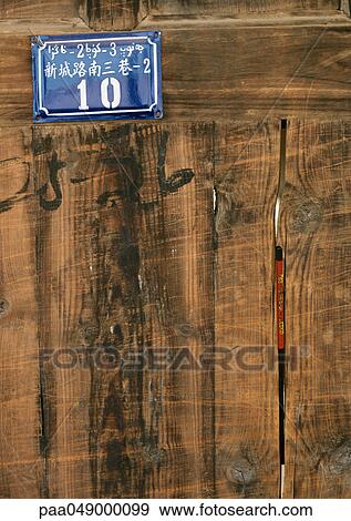 Stock Photo - China, sign on door. Fotosearch