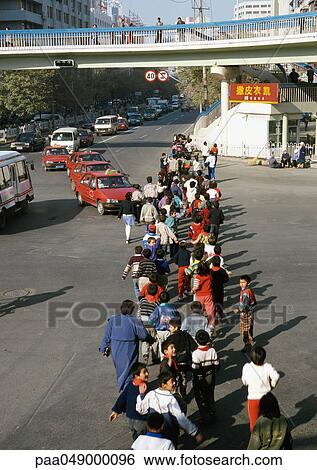 China, Xinjiang Province, Urumqi, group of children crossing street View Large Photo Image Stock Photograph - China, Xinjiang Province, Urumqi, group of children crossing street. Fotosearch
