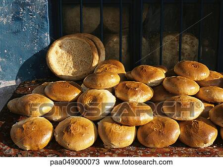 China, Xinjiang Province, Urumqi, pile of bread in market View Large Photo Image Stock Image - China, Xinjiang Province, Urumqi, pile of bread in market. Fotosearch