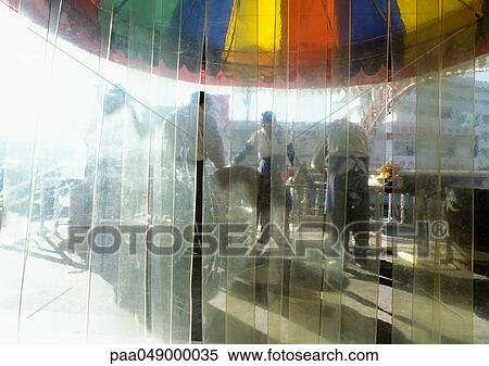 China, Xinjiang, Urumqi, plastic curtain, people wearing aprons, outside View Large Photo Image Stock Photography - China, Xinjiang, Urumqi, plastic curtain, people wearing aprons, outside. Fotosearch