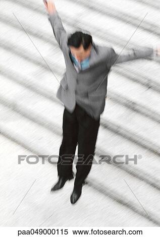 Man jumping down stairs, blurred View Large Photo Image Stock Photography - Man jumping down stairs, blurred. Fotosearch