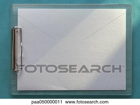 Clipboard holding blank white paper, horizontal, full length, close-up, teal background View Large Photo Image Stock Image - Clipboard holding blank white paper, horizontal, full length, close-up, teal background. Fotosearch
