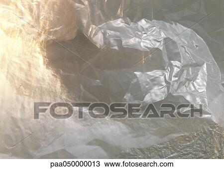 Stock Image - Wrinkled plastic, extreme close-up. Fotosearch