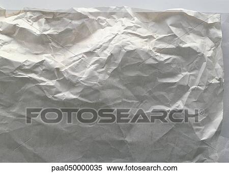 Stock Photography - Wrinkled sheet of paper, close-up. Fotosearch