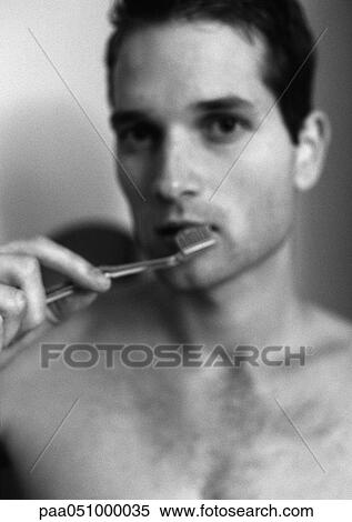 Man brushing teeth, blurred, portrait, b&w View Large Photo Image Stock Photography - Man brushing teeth, blurred, portrait, b&w. Fotosearch