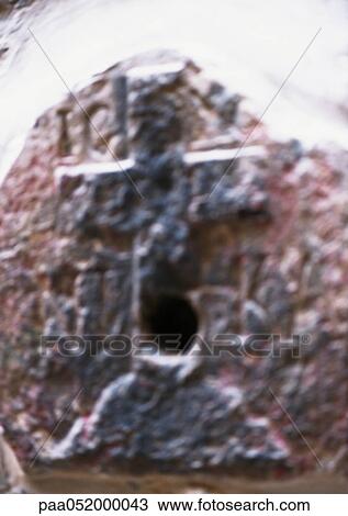 Christian cross carved in stone, blurred View Large Photo Image Stock Image - Christian cross carved in stone, blurred. Fotosearch