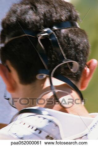 Israel, Jerusalem, boy wearing tefillin, focus on head, rear view View Large Photo Image Stock Image - Israel, Jerusalem, boy wearing tefillin, focus on head, rear view. Fotosearch