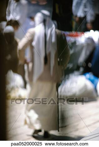 Israel, Jerusalem, man wearing keffieh, rear view, blurred View Large Photo Image Stock Photography - Israel, Jerusalem, man wearing keffieh, rear view, blurred. Fotosearch