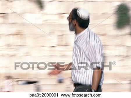 Israel, Jerusalem, mature man wearing kippa near Wailing Wall, blurred View Large Photo Image Stock Image - Israel, Jerusalem, mature man wearing kippa near Wailing Wall, blurred. Fotosearch
