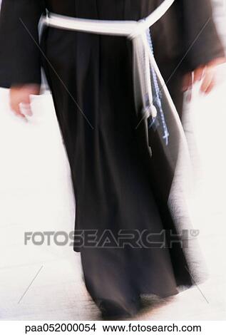 Picture - Israel, Jerusalem, monk, low section, blurred. Fotosearch