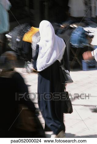 Israel, Jerusalem, Muslim woman in street, rear view View Large Photo Image Picture - Israel, Jerusalem, Muslim woman in street, rear view. Fotosearch