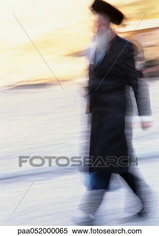 Israel, Jerusalem, Orthodox Jew walking, blurred View Large Photo Image Stock Photography - Israel, Jerusalem, Orthodox Jew walking, blurred. Fotosearch