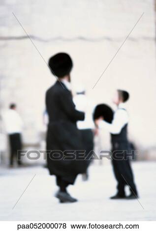 Israel, Jerusalem, Orthodox Jews in street, blurred View Large Photo Image Stock Photo - Israel, Jerusalem, Orthodox Jews in street, blurred. Fotosearch