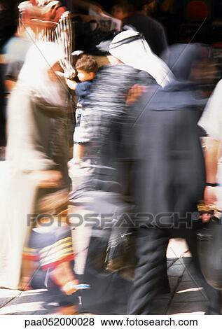 Stock Photo - Israel, Jerusalem, people in street, blurred. Fotosearch