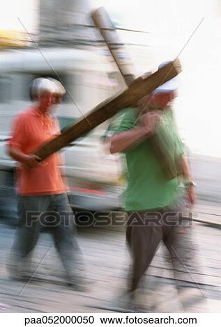 Israel, Jerusalem, two men carrying wooden cross, blurred View Large Photo Image Stock Image - Israel, Jerusalem, two men carrying wooden cross, blurred. Fotosearch