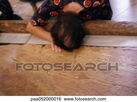Israel, Jerusalem, woman touching head to tomb View Large Photo Image Stock Photograph - Israel, Jerusalem, woman touching head to tomb. Fotosearch