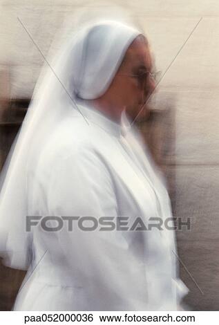 Nun, side view, blurred View Large Photo Image Stock Photograph - Nun, side view, blurred. Fotosearch