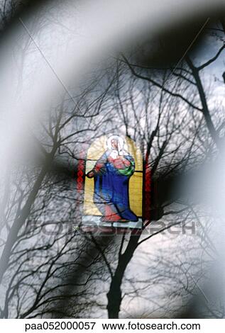Stained-glass window and trees, superimposition of images View Large Photo Image Stock Photo - Stained-glass window and trees, superimposition of images. Fotosearch