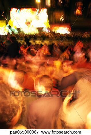Crowd at night, blurred View Large Photo Image Stock Photo - Crowd at night, blurred. Fotosearch
