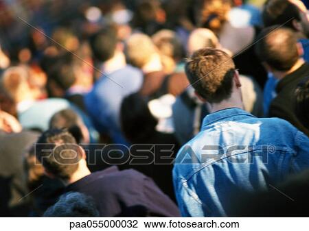 Crowd, head and shoulders, rear view, blurred, tilt View Large Photo Image Stock Image - Crowd, head and shoulders, rear view, blurred, tilt. Fotosearch