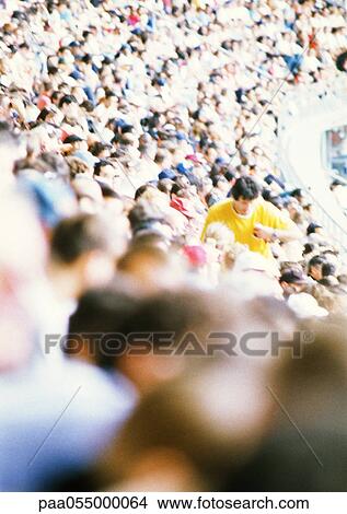 Crowd in stadium, high angle view, blurred View Large Photo Image Picture - Crowd in stadium, high angle view, blurred. Fotosearch