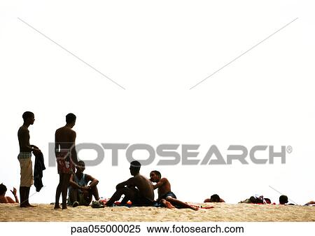 Group of people on beach View Large Photo Image Stock Photography - Group of people on beach. Fotosearch
