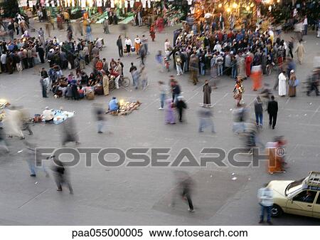 Groups of people gathered in a city square, elevated view, blurred motion View Large Photo Image Stock Photography - Groups of people gathered in a city square, elevated view, blurred motion. Fotosearch
