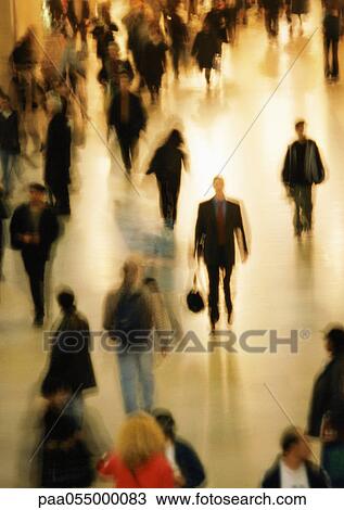 People walking in station, high angle view, blurred View Large Photo Image Stock Image - People walking in station, high angle view, blurred. Fotosearch