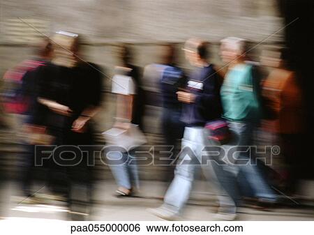 People walking, outside, full length, blurred View Large Photo Image Stock Photograph - People walking, outside, full length, blurred. Fotosearch