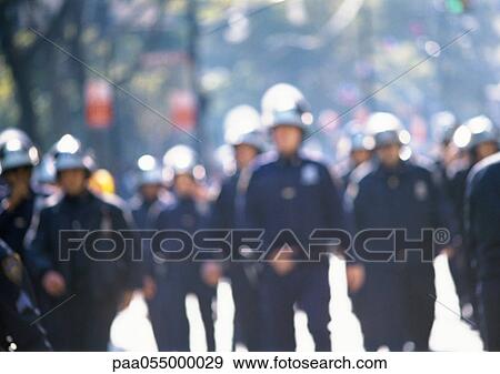 Riot police, blurred View Large Photo Image Stock Photo - Riot police, blurred. Fotosearch