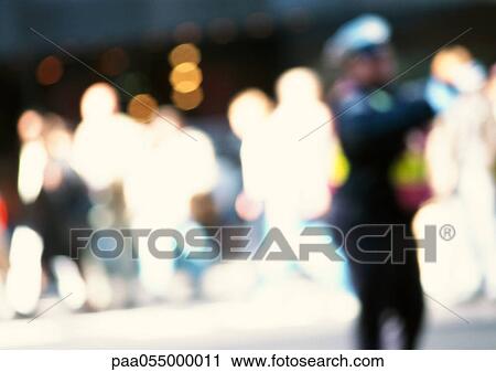 Silhouettes of people in street, blurred View Large Photo Image Stock Image - Silhouettes of people in street, blurred. Fotosearch
