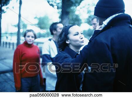 Stock Photo - Group of young people in street. Fotosearch