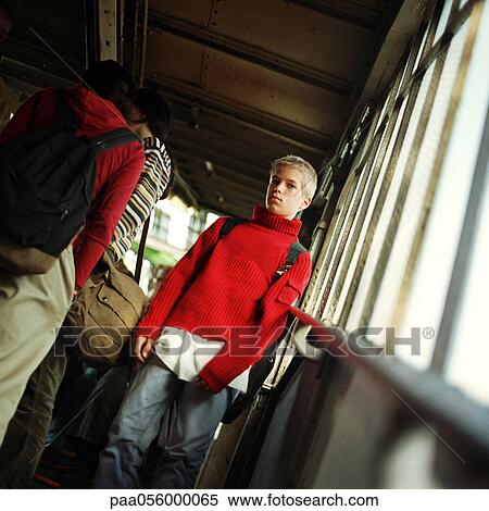 Stock Photography - Teenagers in subway station. Fotosearch