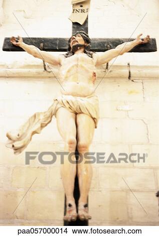 Picture - Crucifixion statue, low angle view. Fotosearch
