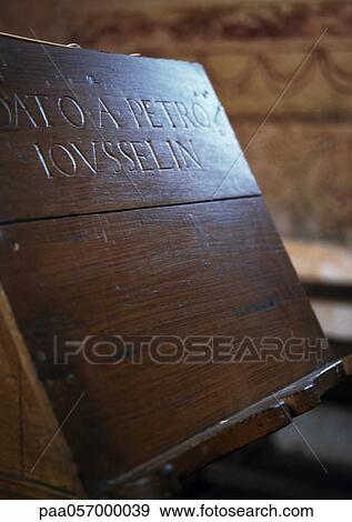 Latin inscription engraved in wood lectern, close-up View Large Photo Image Stock Photo - Latin inscription engraved in wood lectern, close-up. Fotosearch