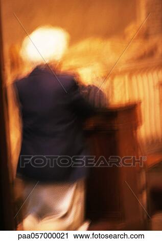 Mature woman kneeling, rear view, blurred View Large Photo Image Stock Image - Mature woman kneeling, rear view, blurred. Fotosearch