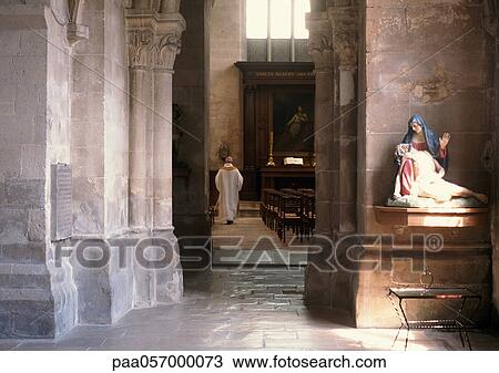 Priest walking in church, rear view View Large Photo Image Stock Image - Priest walking in church, rear view. Fotosearch